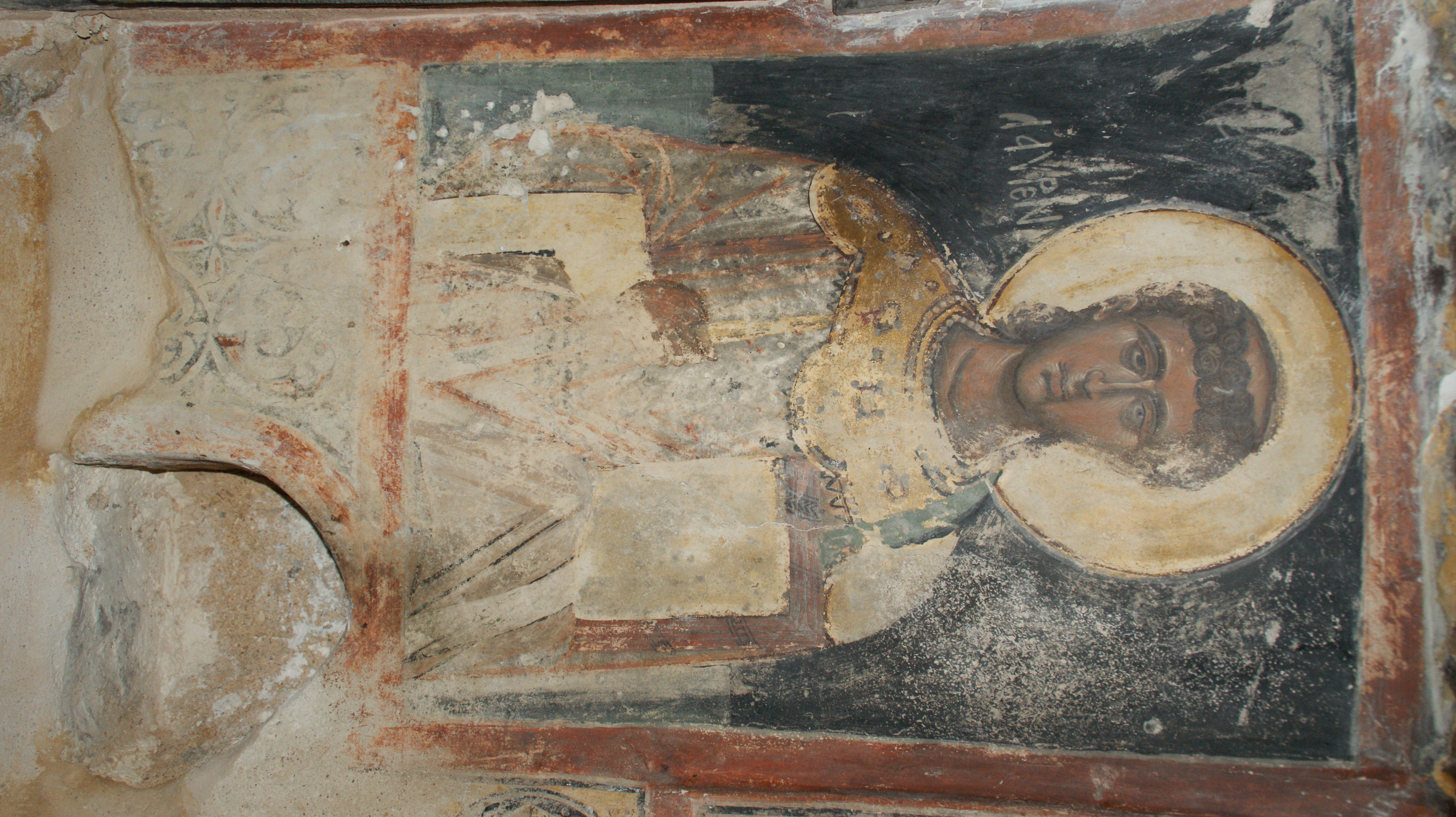 <p>The figure of St. Lawrence, holy bema, Monastery of Archangel Michael Roukouniotis (old <em>katholikon</em>), Symi (source: M. Asfentagakis).</p>