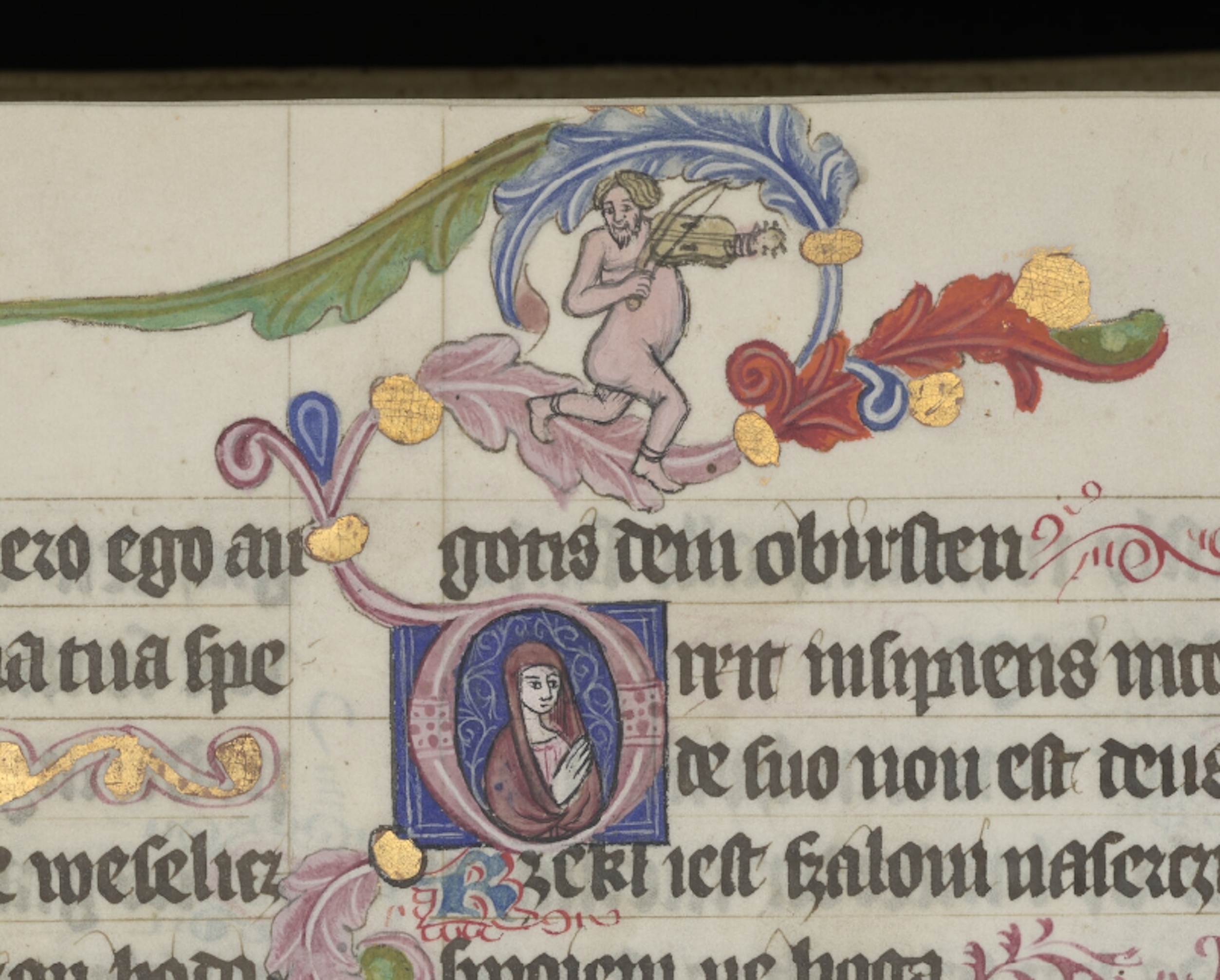 <p>Marginalia and illuminated initial from the Psalter of Saint Florian. This trilingual psalter (in Latin, German, and Polish) is believed to have been made in the scriptorium of the Augustinian canons in Kłodzko, Silesia, in the late 14th century, possibly for Queen Jadwiga. The Polish translation of the Psalms is one of the oldest texts written in Polish. Warsaw, Biblioteka Narodowa, Rps 8002 III, fol. 18r (detail).</p>